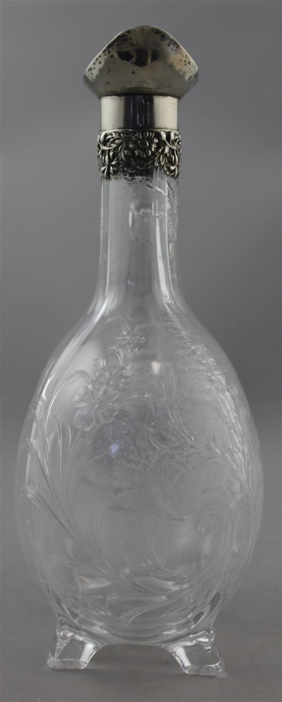 An Edwardian silver mounted rock crystal glass claret jug, c.1904, 24.5cm, crizzling